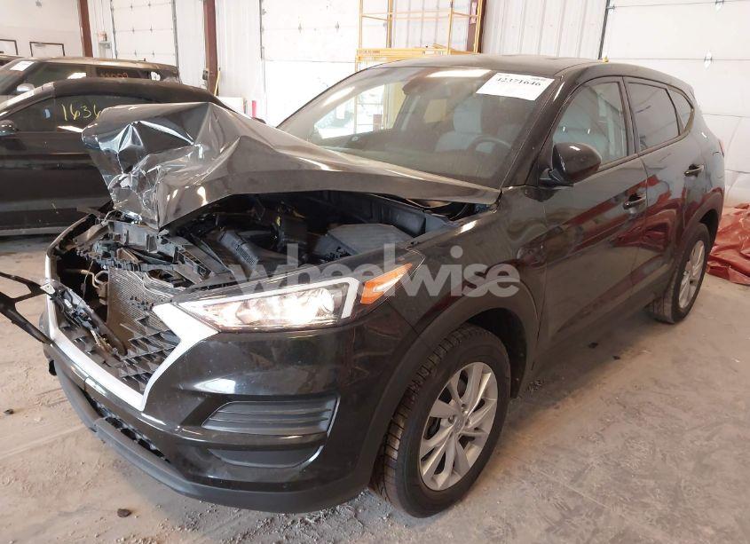 Photo 2 of 2019 Hyundai Tucson SE (VIN KM8J23A41KU857484)