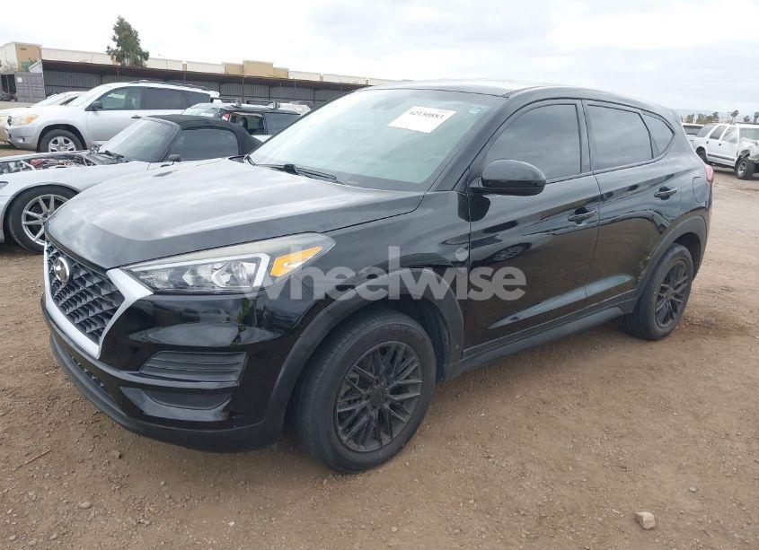 Photo 2 of 2019 Hyundai Tucson SE (VIN KM8J23A47KU938134)