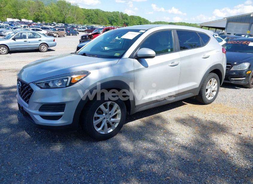 Photo 2 of 2019 Hyundai Tucson SE (VIN KM8J2CA43KU010613)