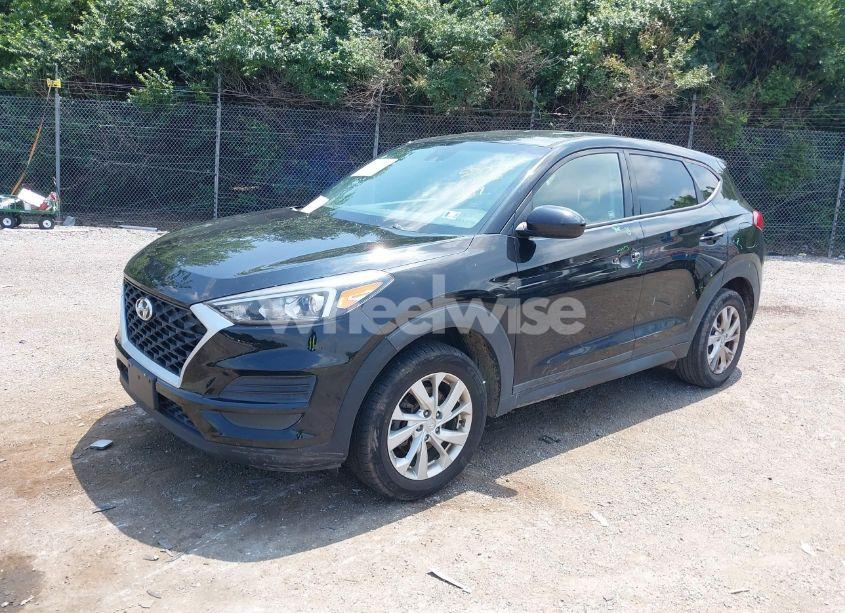 Photo 2 of 2019 Hyundai Tucson SE (VIN KM8J2CA46KU865080)