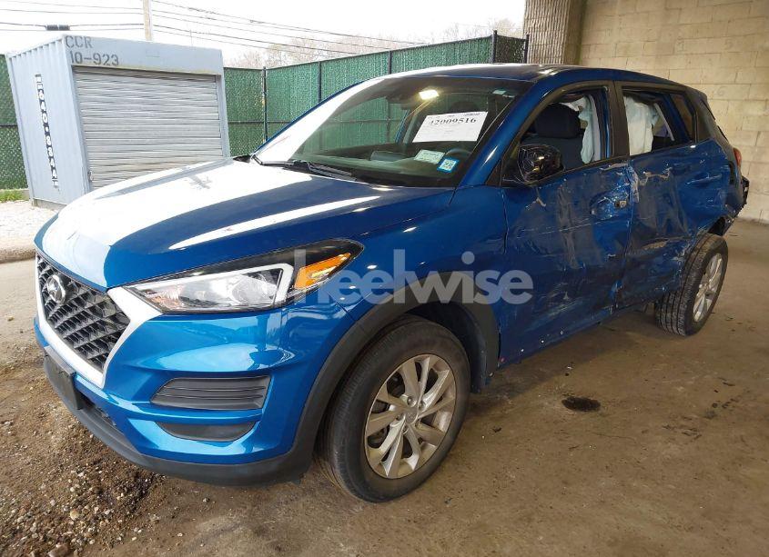 Photo 2 of 2019 Hyundai Tucson SE (VIN KM8J2CA48KU993577)