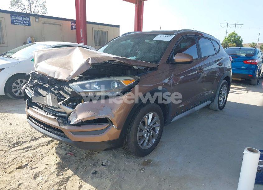 Photo 2 of 2017 Hyundai Tucson SE (VIN KM8J33A46HU489597)