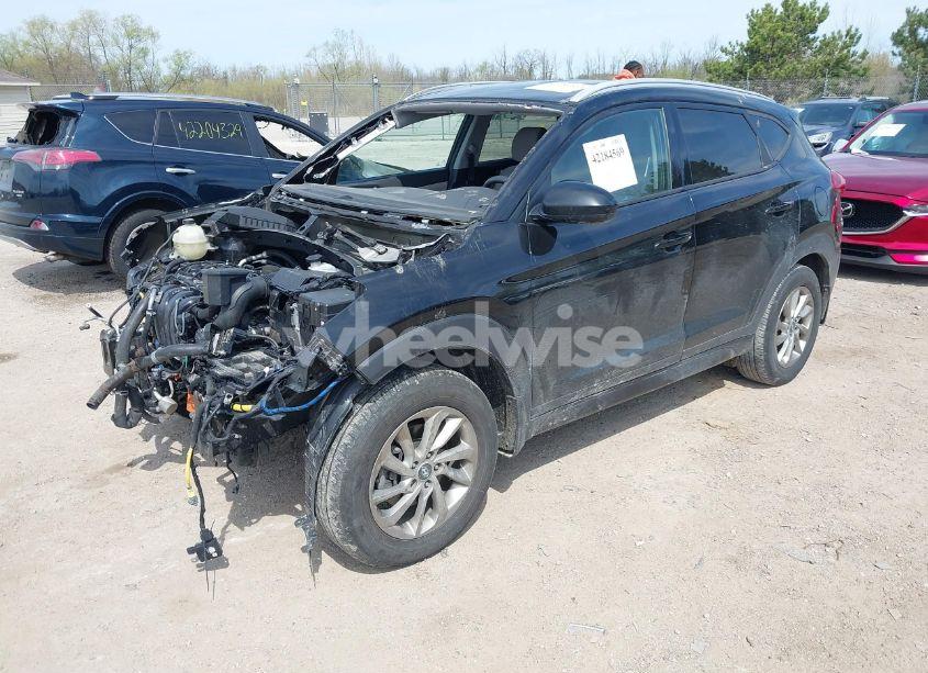 Photo 2 of 2016 Hyundai Tucson SE (VIN KM8J33A4XGU149335)
