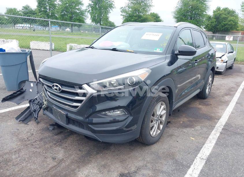 Photo 2 of 2017 Hyundai Tucson SE (VIN KM8J3CA40HU290786)