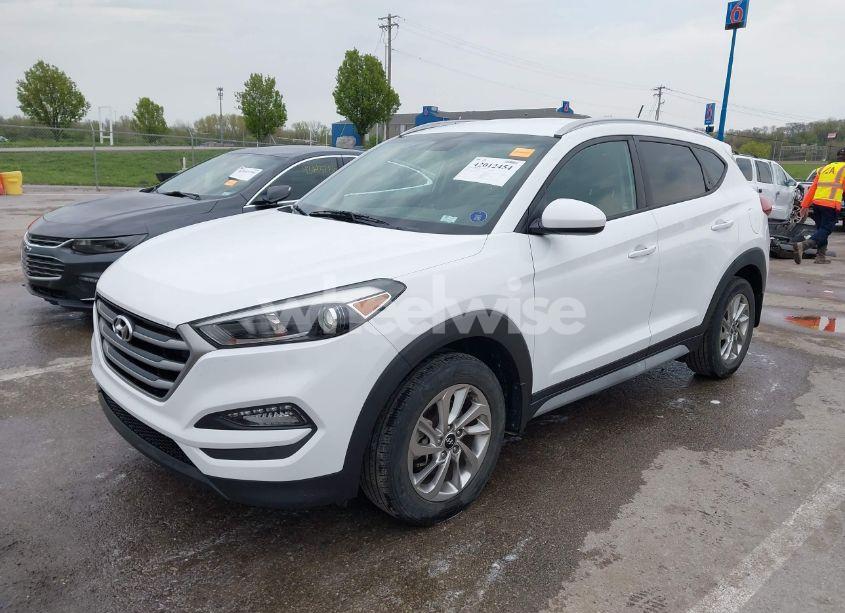 Photo 2 of 2017 Hyundai Tucson SE (VIN KM8J3CA40HU508757)
