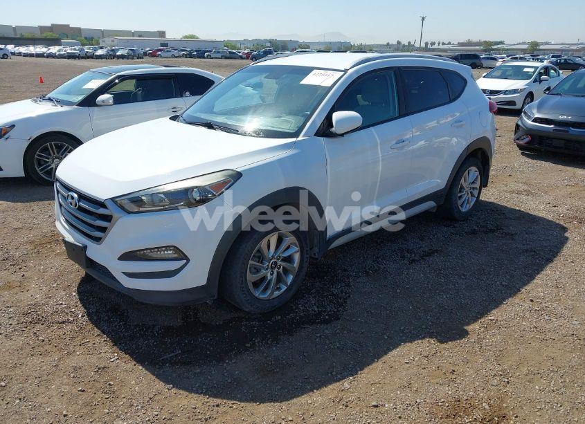 Photo 2 of 2017 Hyundai Tucson SE (VIN KM8J3CA43HU566474)