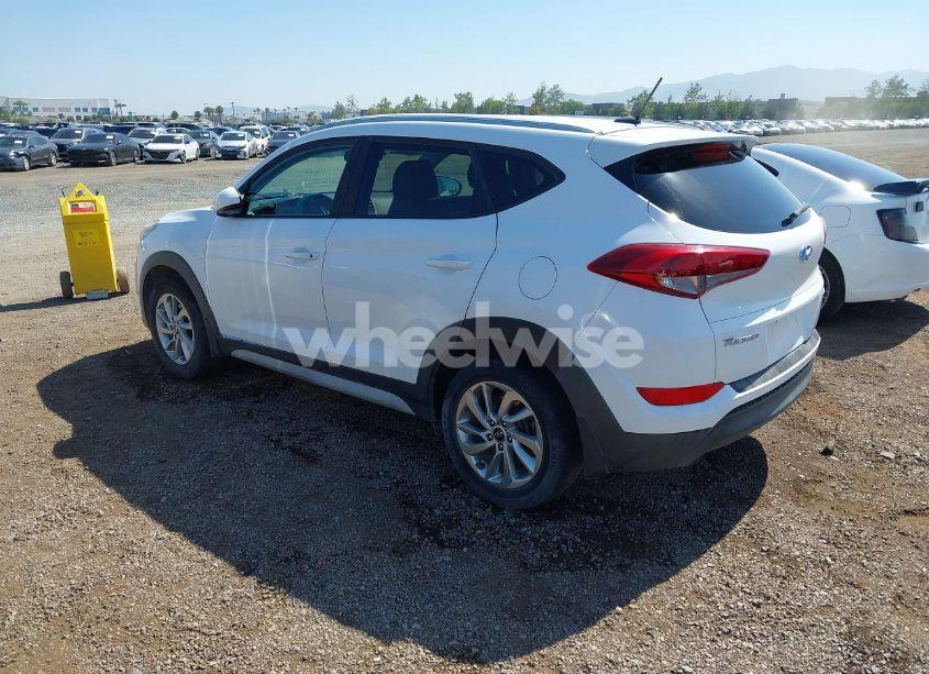 Photo 3 of 2017 Hyundai Tucson SE (VIN KM8J3CA43HU566474)