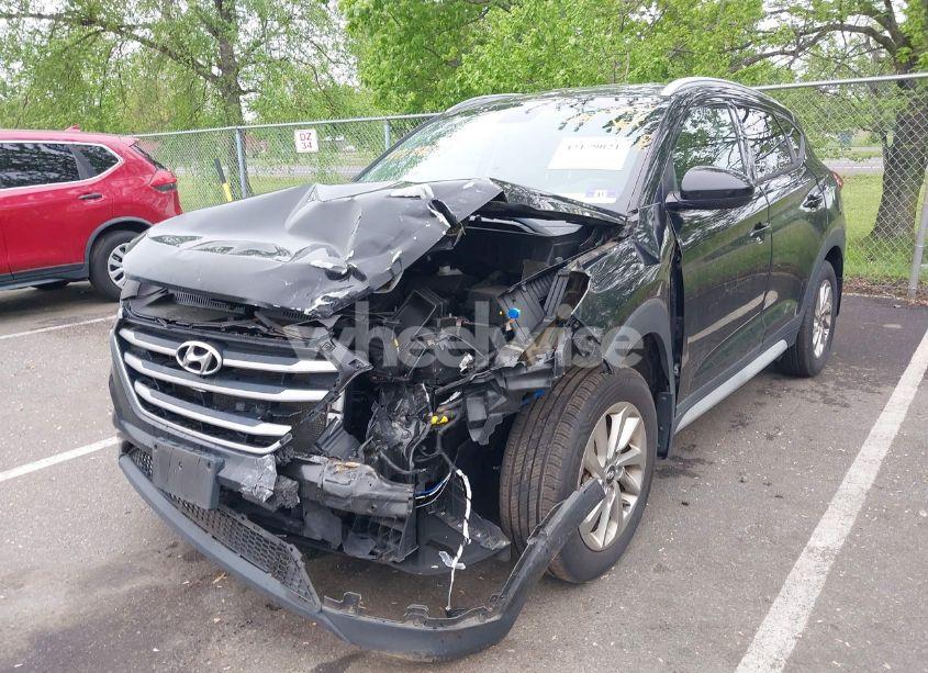 Photo 2 of 2017 Hyundai Tucson SE (VIN KM8J3CA44HU524797)