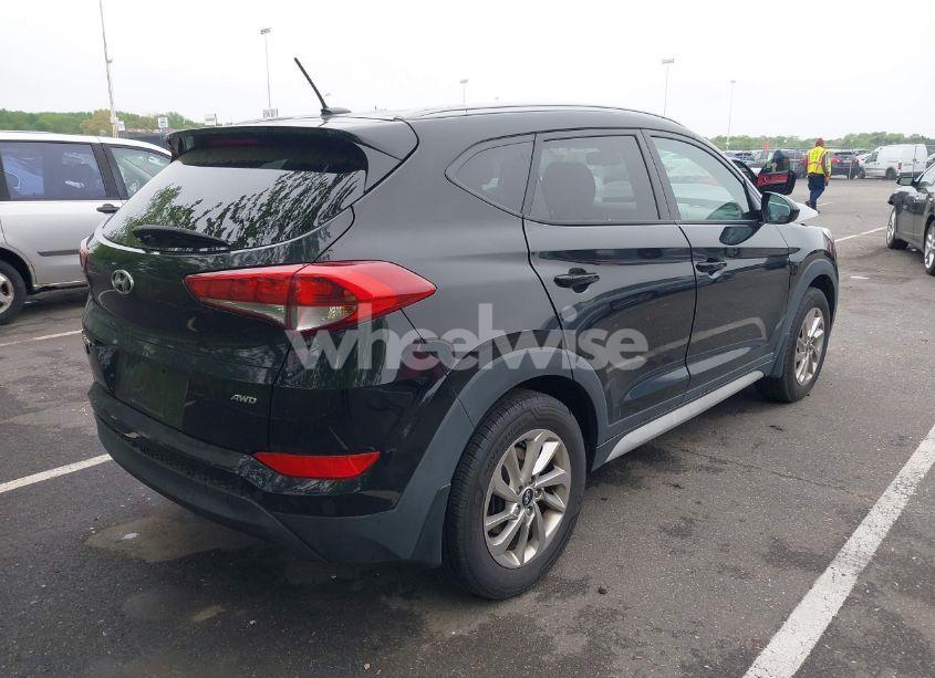 Photo 4 of 2017 Hyundai Tucson SE (VIN KM8J3CA44HU524797)