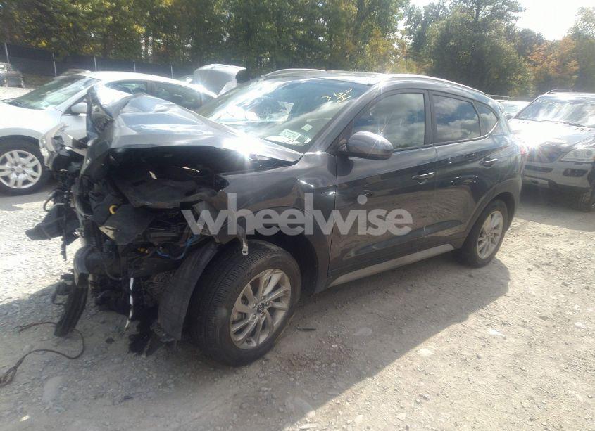 Photo 2 of 2017 Hyundai Tucson SE (VIN KM8J3CA47HU574450)