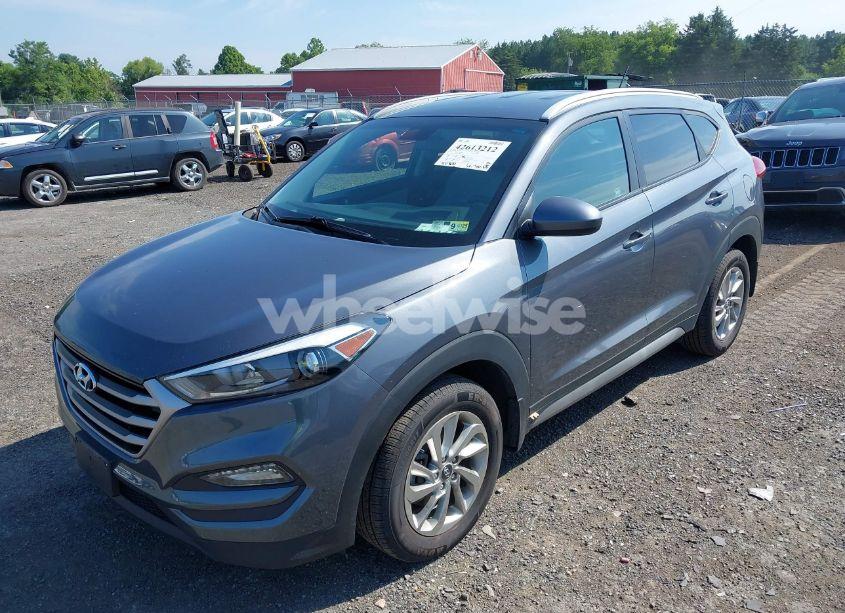 Photo 2 of 2017 Hyundai Tucson SE (VIN KM8J3CA49HU288941)