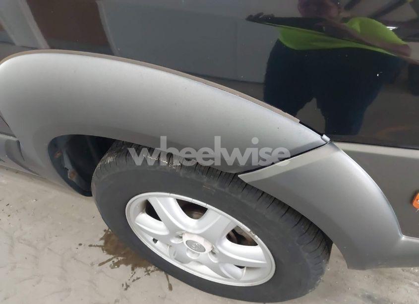 Photo 12 of 2005 Hyundai Tucson GLS/LX (VIN KM8JN72D65U142203)