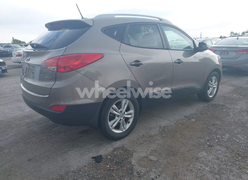 Photo 4 of 2012 Hyundai Tucson GLS (VIN KM8JU3AC0CU502518)