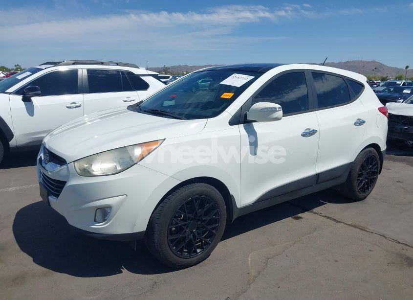 Photo 2 of 2012 Hyundai Tucson LIMITED (VIN KM8JU3AC2CU388098)