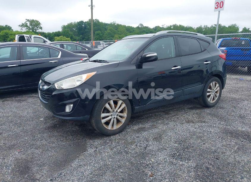 Photo 2 of 2012 Hyundai Tucson LIMITED (VIN KM8JU3AC8CU339214)