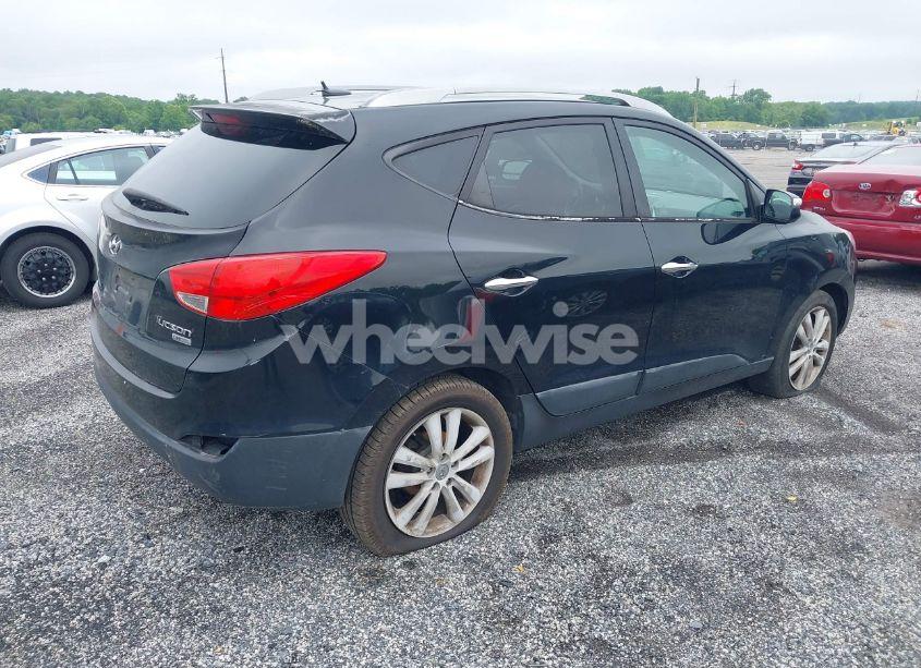 Photo 4 of 2012 Hyundai Tucson LIMITED (VIN KM8JU3AC8CU339214)