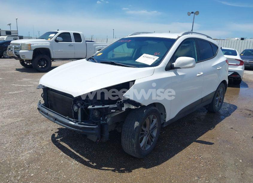 Photo 2 of 2014 Hyundai Tucson SE (VIN KM8JU3AG3EU800406)