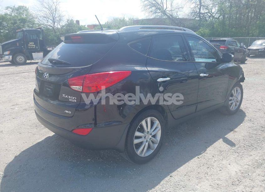 Photo 4 of 2013 Hyundai Tucson LIMITED (VIN KM8JUCAC0DU583070)