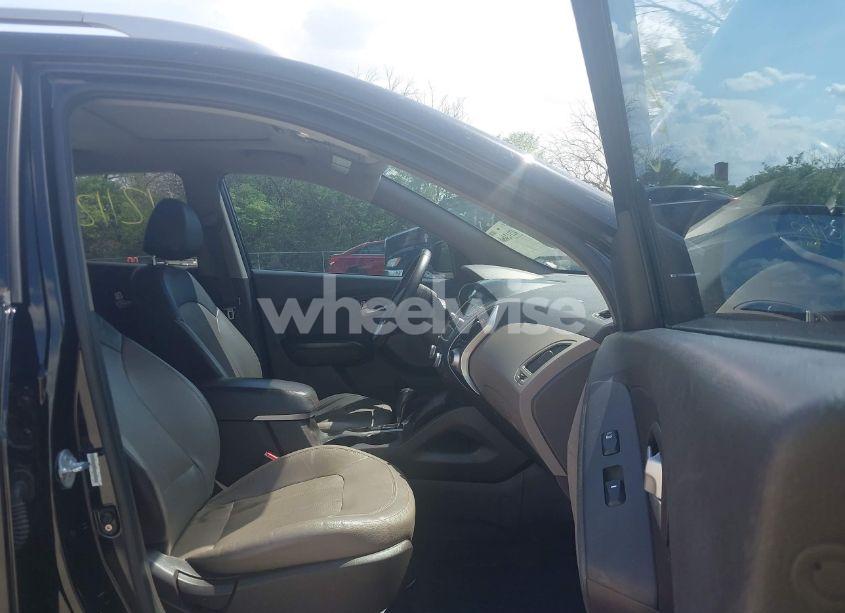 Photo 5 of 2013 Hyundai Tucson LIMITED (VIN KM8JUCAC0DU583070)