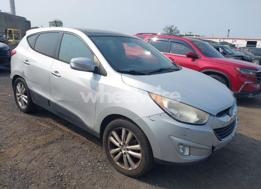 2011 Hyundai Tucson LIMITED (VIN KM8JUCAC1BU140942) main photo