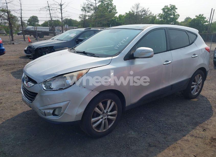 Photo 2 of 2011 Hyundai Tucson LIMITED (VIN KM8JUCAC1BU140942)