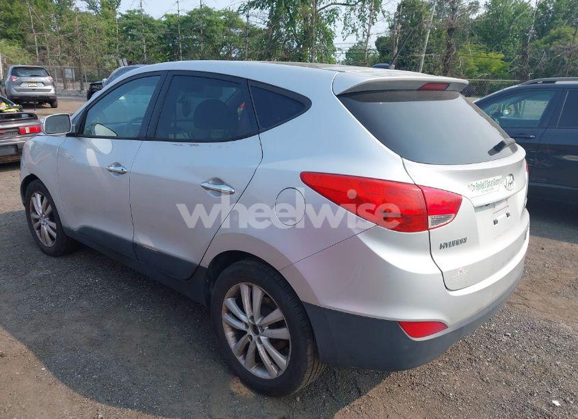Photo 3 of 2011 Hyundai Tucson LIMITED (VIN KM8JUCAC1BU140942)