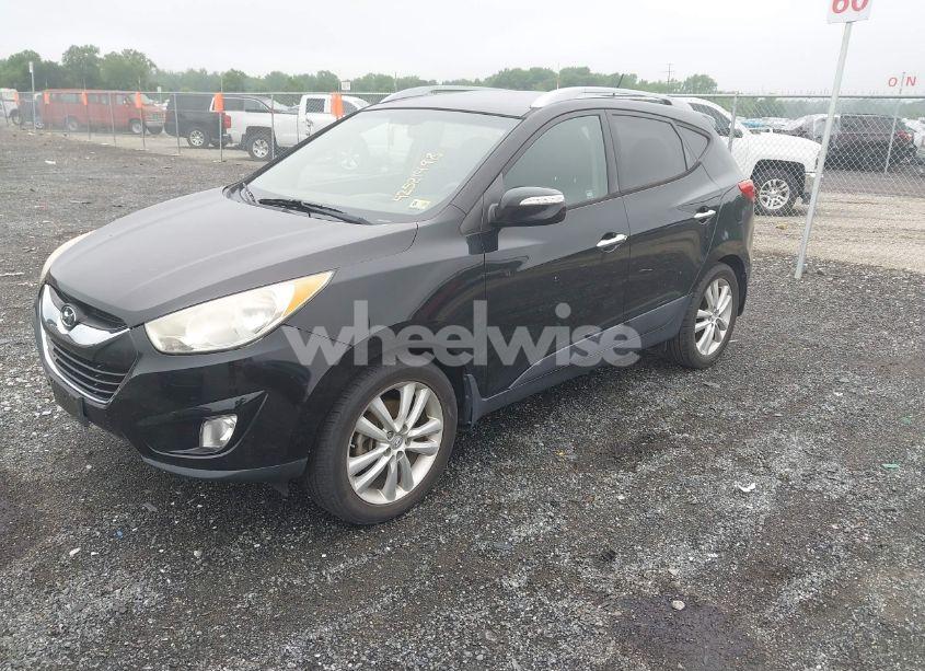 Photo 2 of 2012 Hyundai Tucson LIMITED (VIN KM8JUCAC1CU481842)