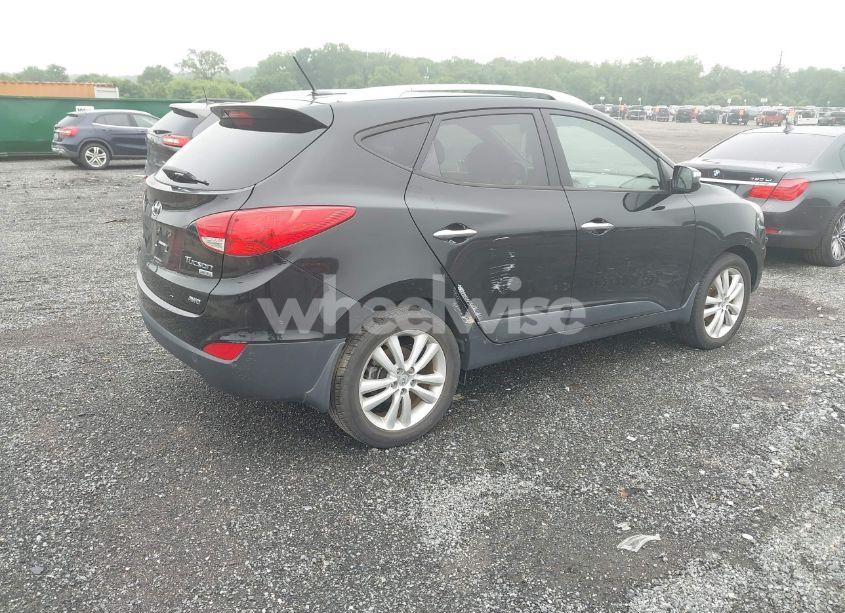 Photo 4 of 2012 Hyundai Tucson LIMITED (VIN KM8JUCAC1CU481842)