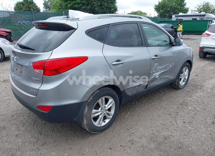 Photo 4 of 2012 Hyundai Tucson GLS (VIN KM8JUCAC2CU500429)