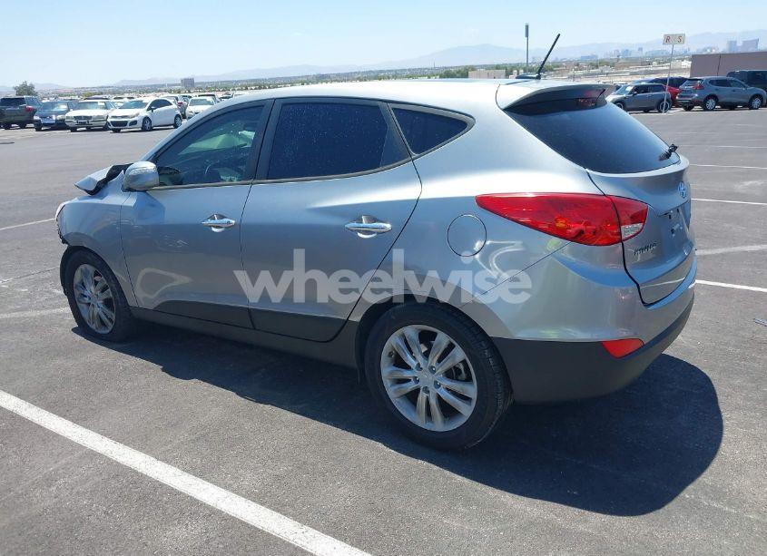 Photo 3 of 2012 Hyundai Tucson LIMITED (VIN KM8JUCAC3CU383119)