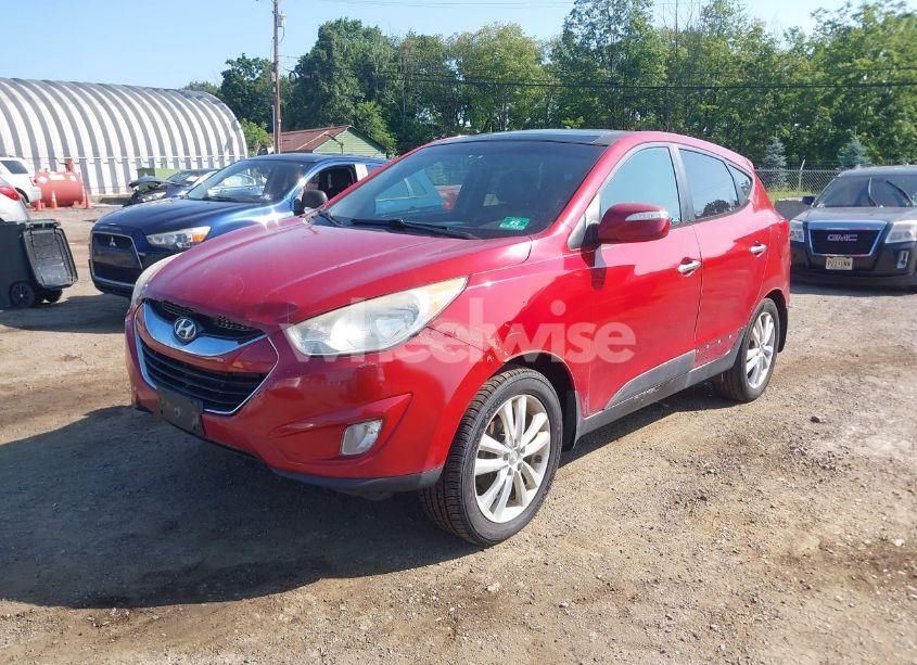 Photo 2 of 2012 Hyundai Tucson LIMITED (VIN KM8JUCAC3CU434036)