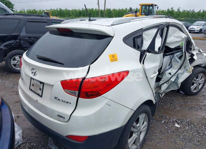Photo 4 of 2012 Hyundai Tucson GLS (VIN KM8JUCAC3CU534265)
