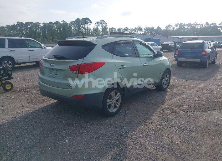 Photo 4 of 2013 Hyundai Tucson GLS (VIN KM8JUCAC3DU558454)