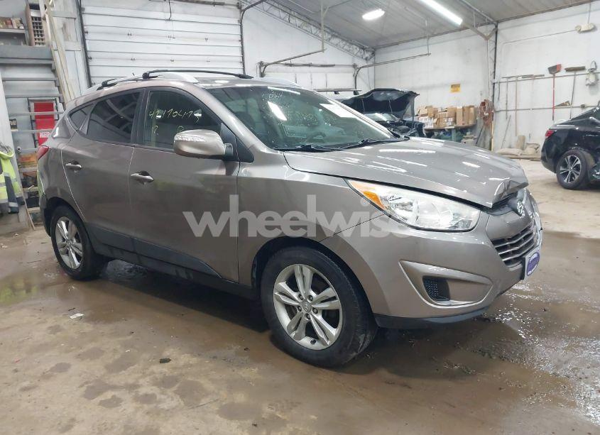 2012 Hyundai Tucson GLS (VIN KM8JUCAC6CU380053) main photo