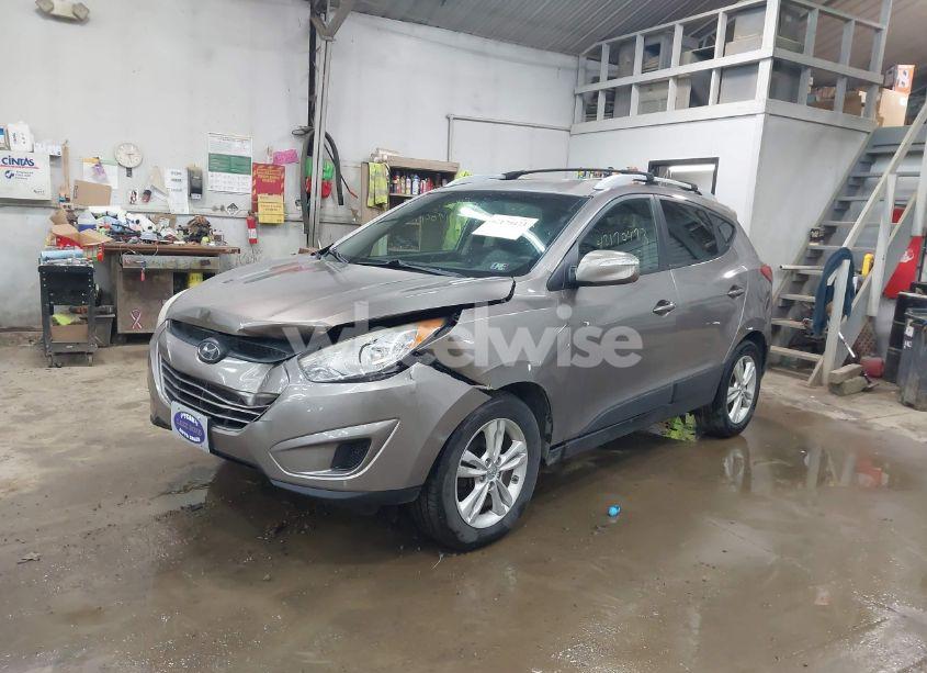 Photo 2 of 2012 Hyundai Tucson GLS (VIN KM8JUCAC6CU380053)