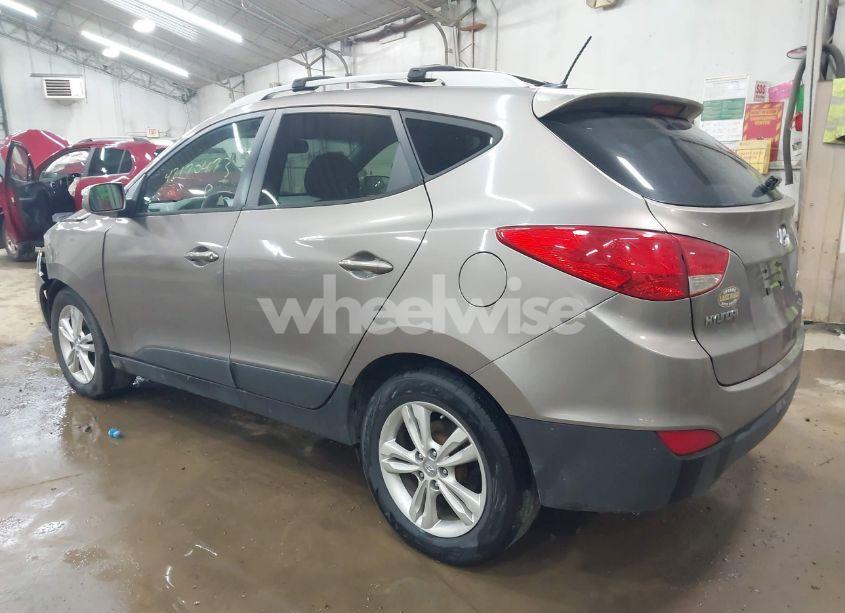 Photo 3 of 2012 Hyundai Tucson GLS (VIN KM8JUCAC6CU380053)