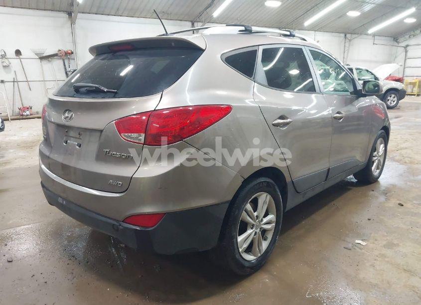 Photo 4 of 2012 Hyundai Tucson GLS (VIN KM8JUCAC6CU380053)