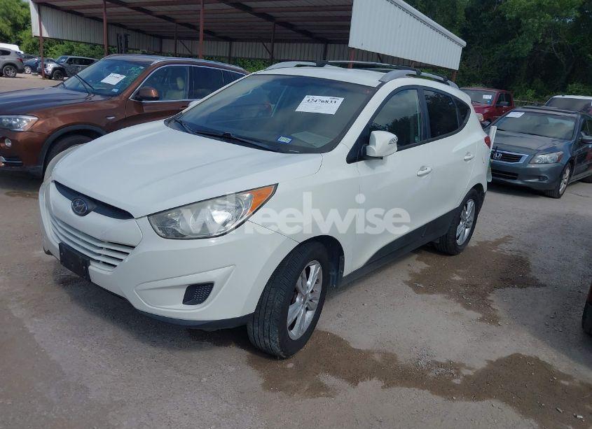 Photo 2 of 2012 Hyundai Tucson GLS (VIN KM8JUCAC6CU430515)
