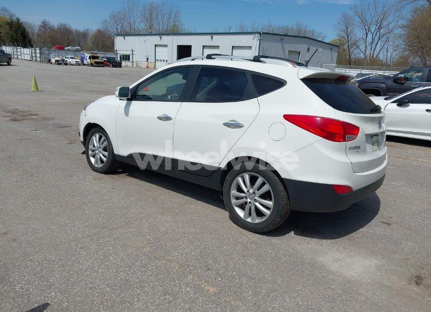 Photo 3 of 2013 Hyundai Tucson LIMITED (VIN KM8JUCAC6DU560442)