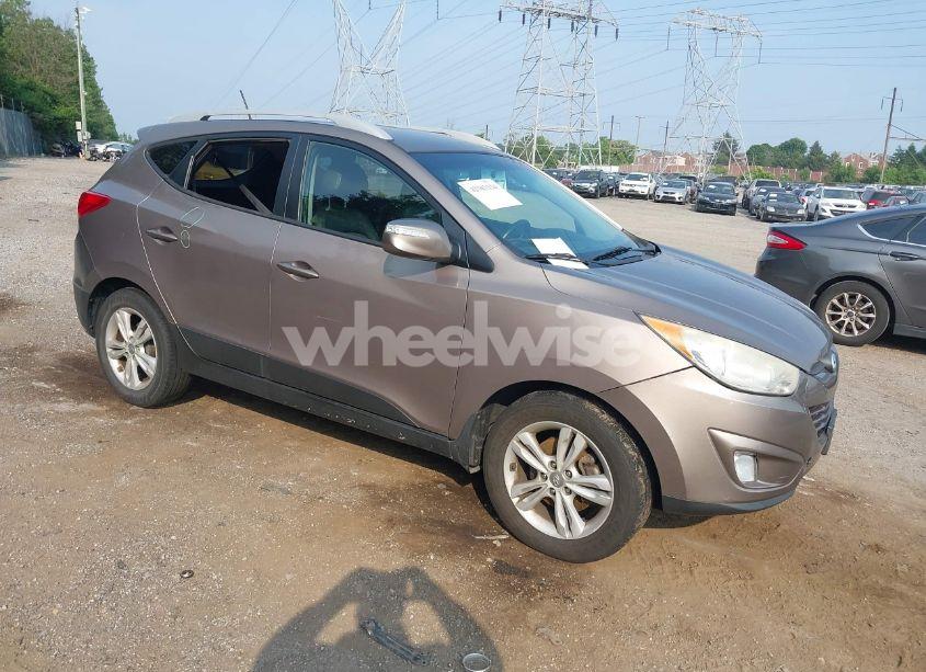 2013 Hyundai Tucson GLS (VIN KM8JUCAC6DU696442) main photo