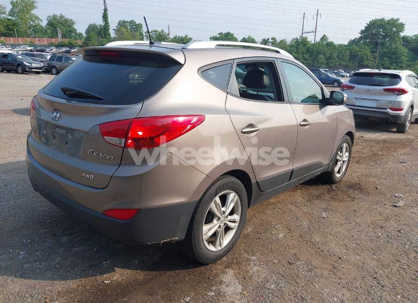 Photo 4 of 2013 Hyundai Tucson GLS (VIN KM8JUCAC6DU696442)