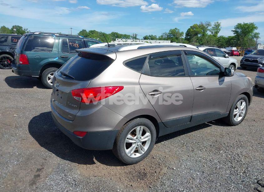 Photo 4 of 2012 Hyundai Tucson GLS (VIN KM8JUCAC7CU492540)