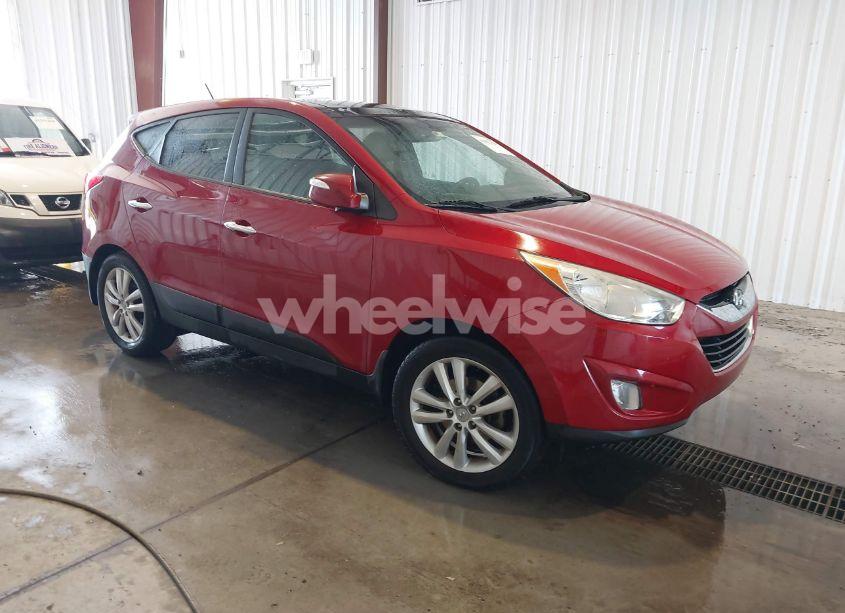 2012 Hyundai Tucson LIMITED (VIN KM8JUCAC7CU542739) main photo