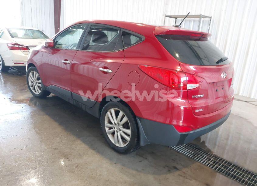 Photo 3 of 2012 Hyundai Tucson LIMITED (VIN KM8JUCAC7CU542739)