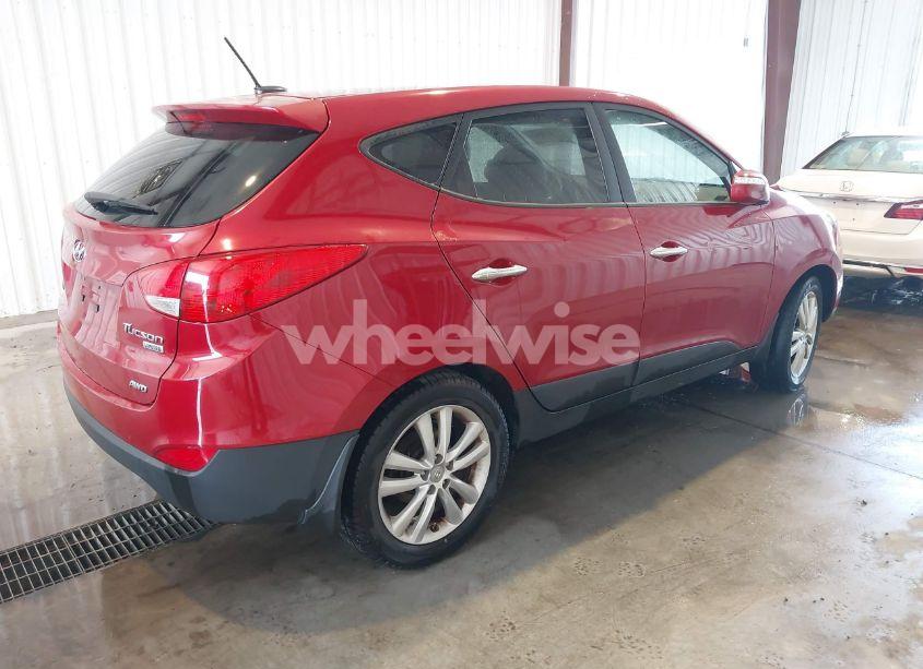 Photo 4 of 2012 Hyundai Tucson LIMITED (VIN KM8JUCAC7CU542739)