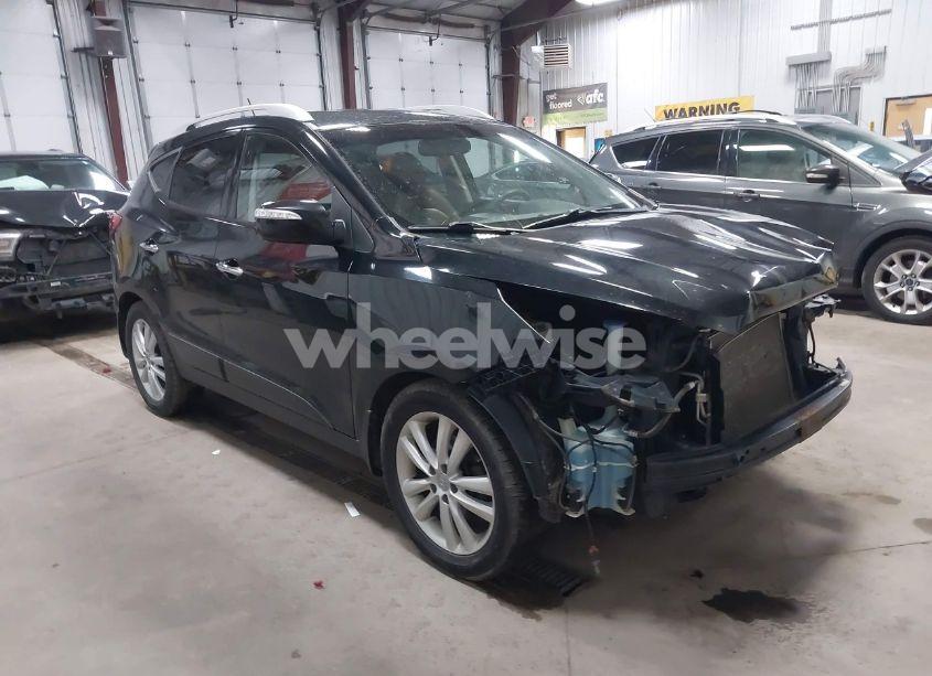 2011 Hyundai Tucson LIMITED (VIN KM8JUCAC8BU248541) main photo