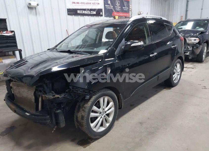 Photo 2 of 2011 Hyundai Tucson LIMITED (VIN KM8JUCAC8BU248541)