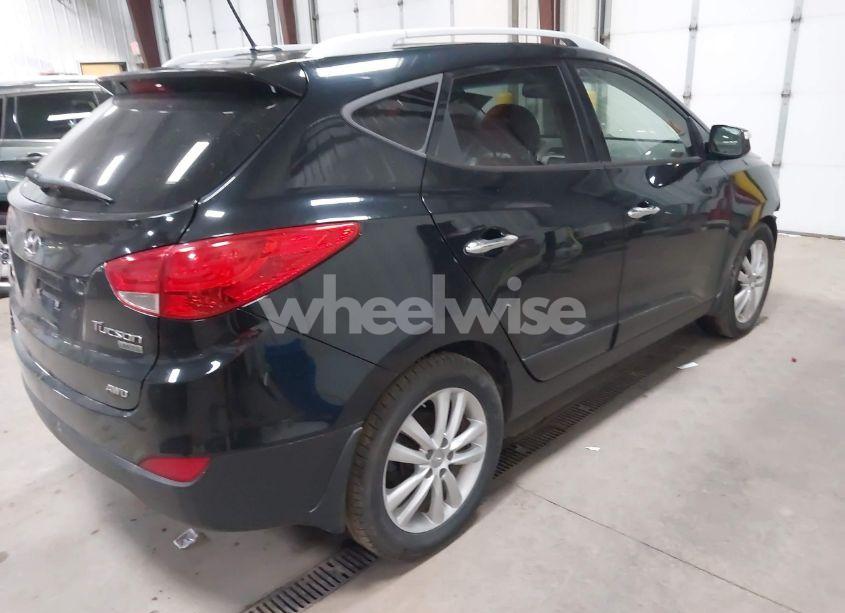 Photo 4 of 2011 Hyundai Tucson LIMITED (VIN KM8JUCAC8BU248541)