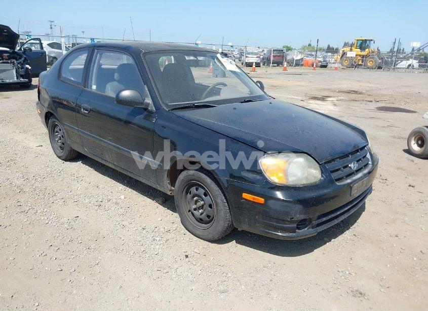 2003 Hyundai Accent (VIN KMHCF35CX3U271513) main photo