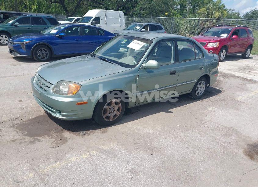 Photo 2 of 2004 Hyundai Accent GL (VIN KMHCG45C54U540120)